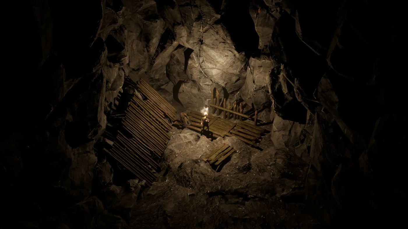 Une mine souterraine éclairée, avec ses échafaudages et ses plateformes de bois