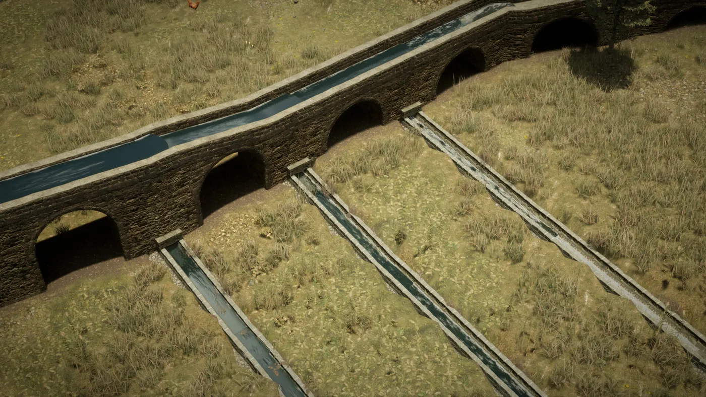 Un aqueduc suivant la pente d'un versant vers une colonie en contrebas